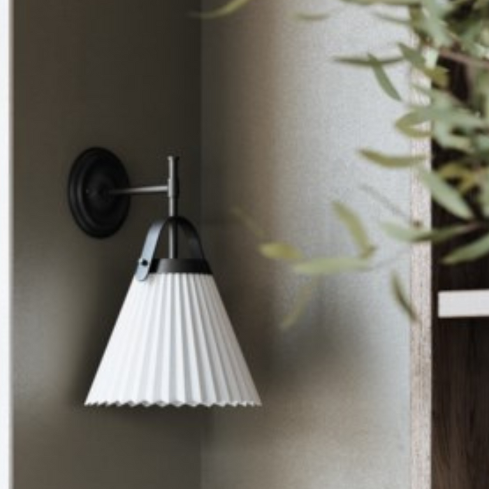 Kismet wall sconce by Maxim Lighting in gold with pleated white shade