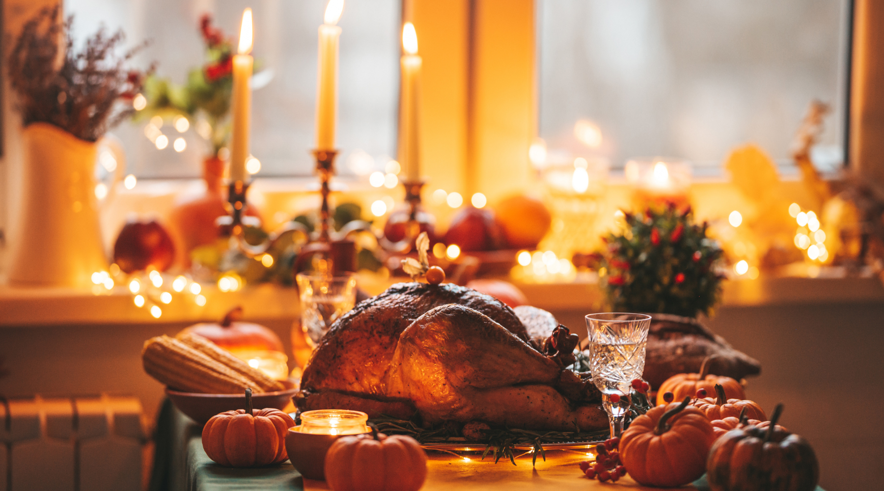 Thanksgiving tablescape with a turkey and candles