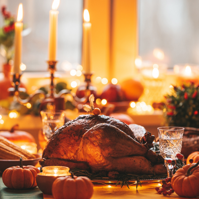 Thanksgiving tablescape with a turkey and candles