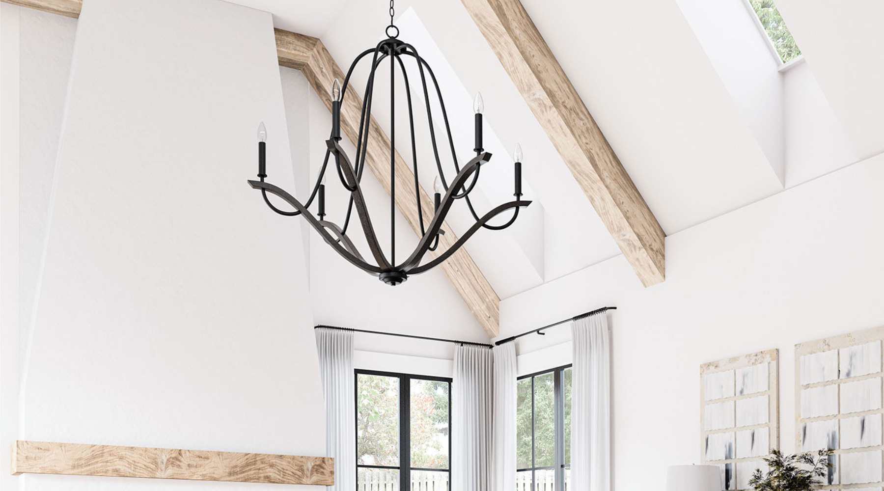 Capital Chandelier hanging in living room with vaulted ceiling and wood beams