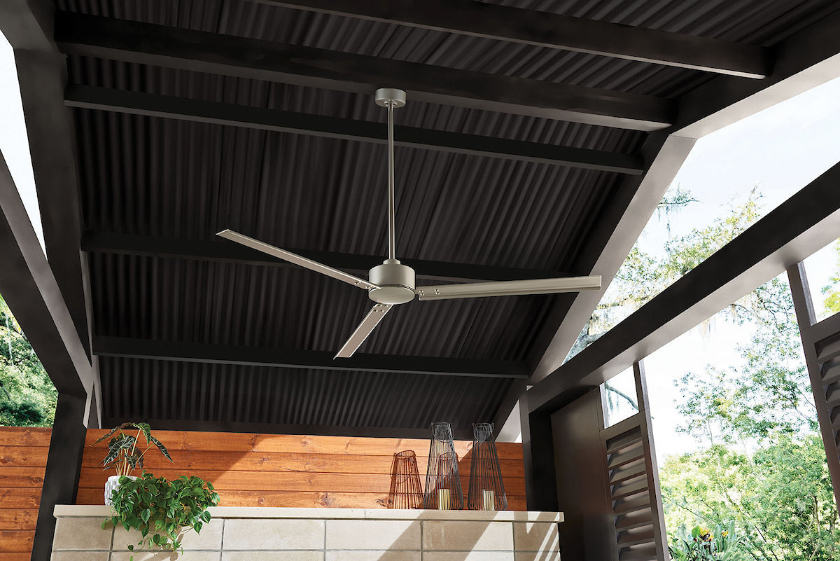Three blade silver ceiling fan hanging from a black vaulted celing