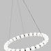 Close up image of a round contemporary modern chandelier with several globe shades. 