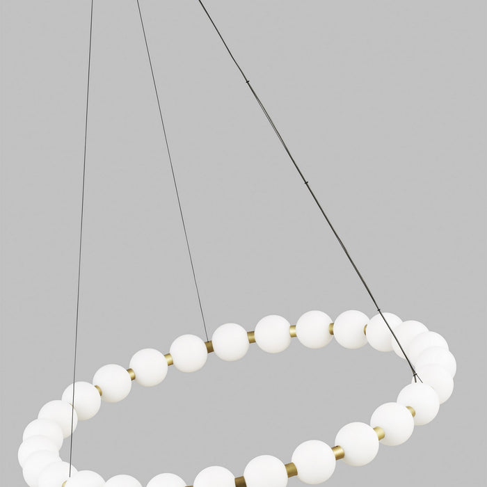 Modern chandelier with white spherical bulbs on a gray background