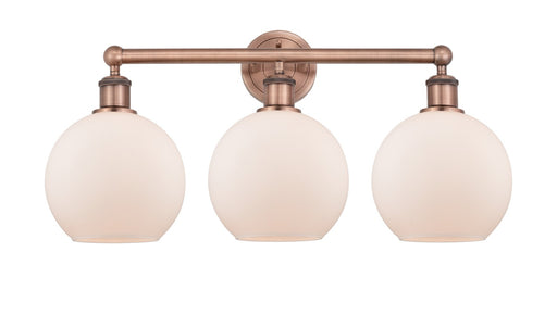 Edison Three Light Bath Vanity Antique Copper