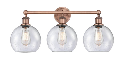 Edison Three Light Bath Vanity Antique Copper