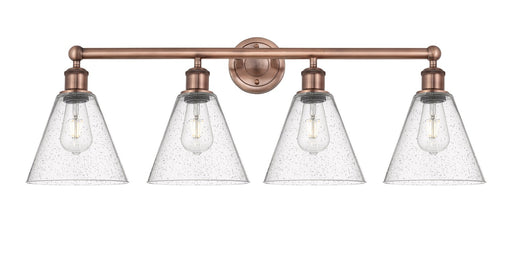 Edison Four Light Bath Vanity Antique Copper