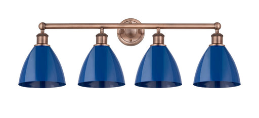 Edison Four Light Bath Vanity Antique Copper