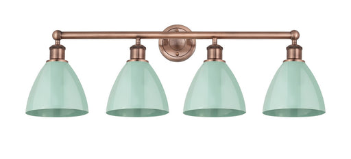 Edison Four Light Bath Vanity Antique Copper