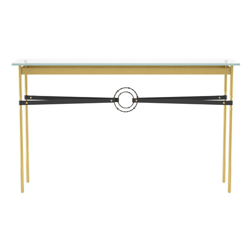 Desk with brown leather belt centerpiece and glass top, gold frame, minimalistic office furniture style.