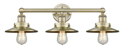 Edison Three Light Bath Vanity Antique Brass