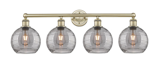 Edison Four Light Bath Vanity Antique Brass