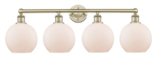 Edison Four Light Bath Vanity Antique Brass