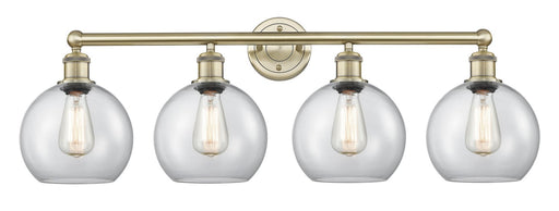Edison Four Light Bath Vanity Antique Brass