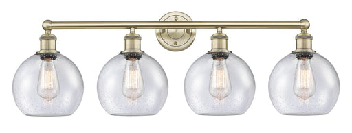 Edison Four Light Bath Vanity Antique Brass