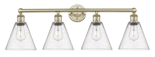 Edison Four Light Bath Vanity Antique Brass