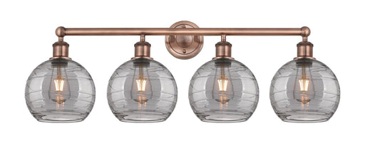 Edison Four Light Bath Vanity Antique Copper