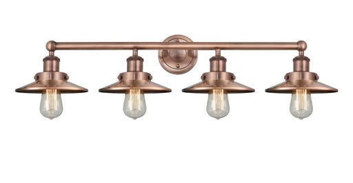 Edison Four Light Bath Vanity Antique Copper
