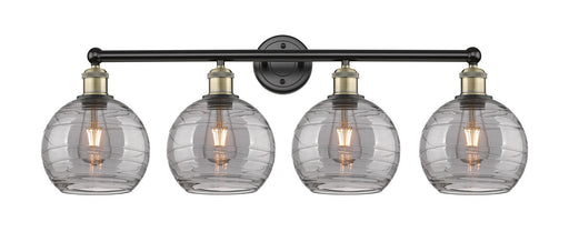 Edison Four Light Bath Vanity Black Antique Brass
