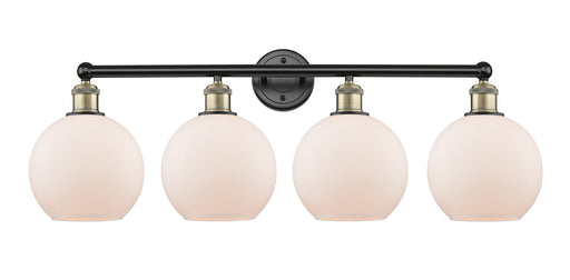 Edison Four Light Bath Vanity Black Antique Brass