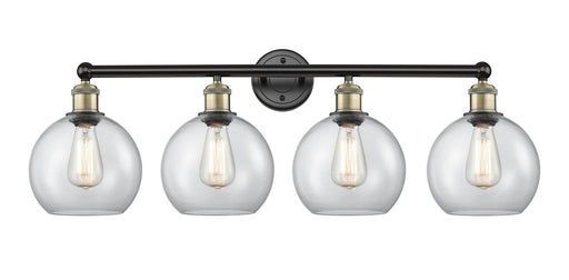 Edison Four Light Bath Vanity Black Antique Brass