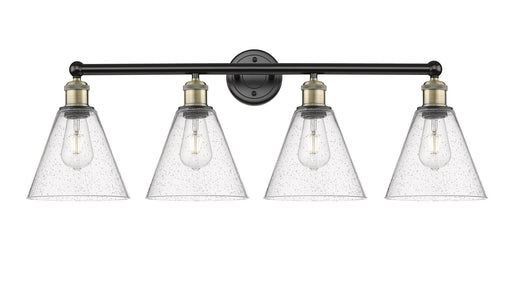 Edison Four Light Bath Vanity Black Antique Brass