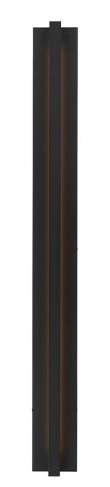 Tall black pull handle shaped sconce with LED light on.