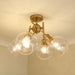 Golden - 1945-SF BCB-GLOBE-CLR - Four Light Semi-Flush Mount - Axel - Brushed Champagne Brass