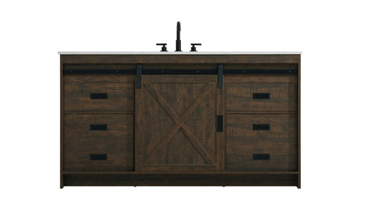 Dark stained wooden bathroom vanity with sliding barn door and five drawers, black hardware, and two faucets on top.