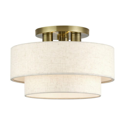 Manorwood Three Light Semi-Flush Mount Antique Brass