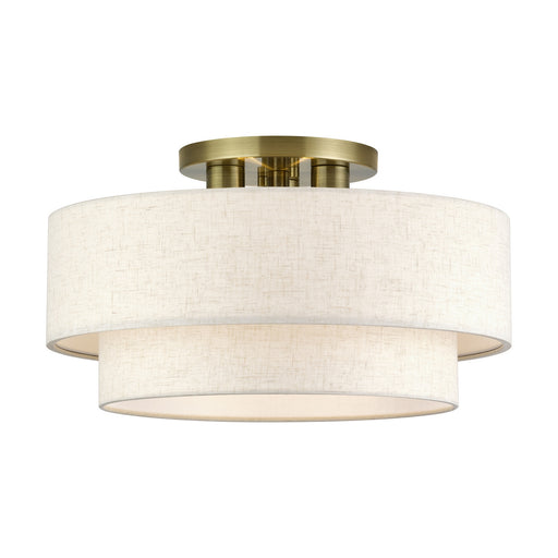 Manorwood Three Light Semi-Flush Mount Antique Brass