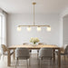 Generation Lighting - GLC1814SBE - Four Light Linear Chandelier - Nube - Satin Brass