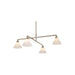 Modern brushed nickel linear chandelier with four illuminated white pleated cone shades.