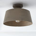 Bronze metal shade semi-flush hangs from a white ceiling