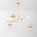 Modern chandelier with gold branches and white spherical lights on a light gray background
