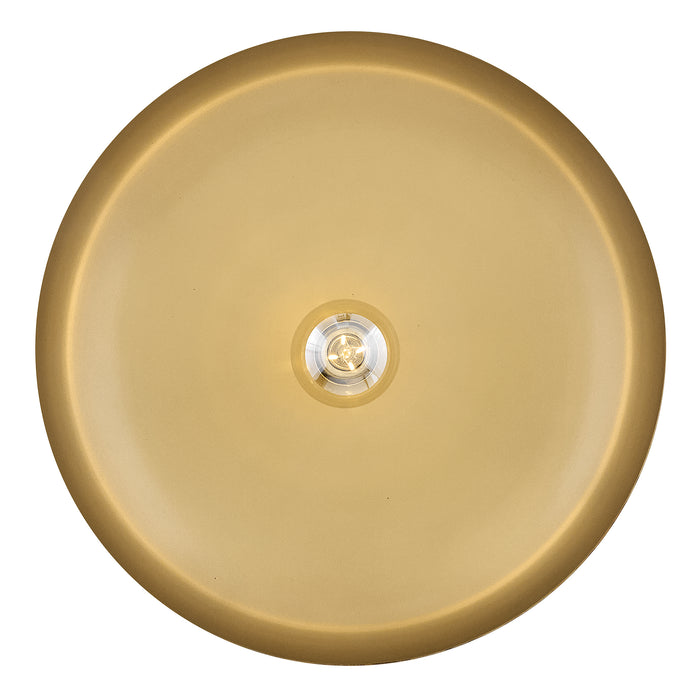 Gold circular object with a central light source on a white background