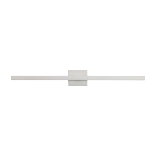 A minimalist wall-mounted light fixture with a long horizontal bar and a central square plate, shown in a very light warm gray or off-white finish against a solid white background.