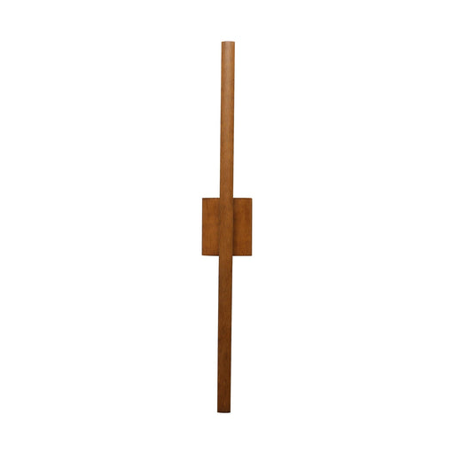 A minimalist wall-mounted wooden light fixture with a vertical bar and a rectangular block, shown against a plain white background.