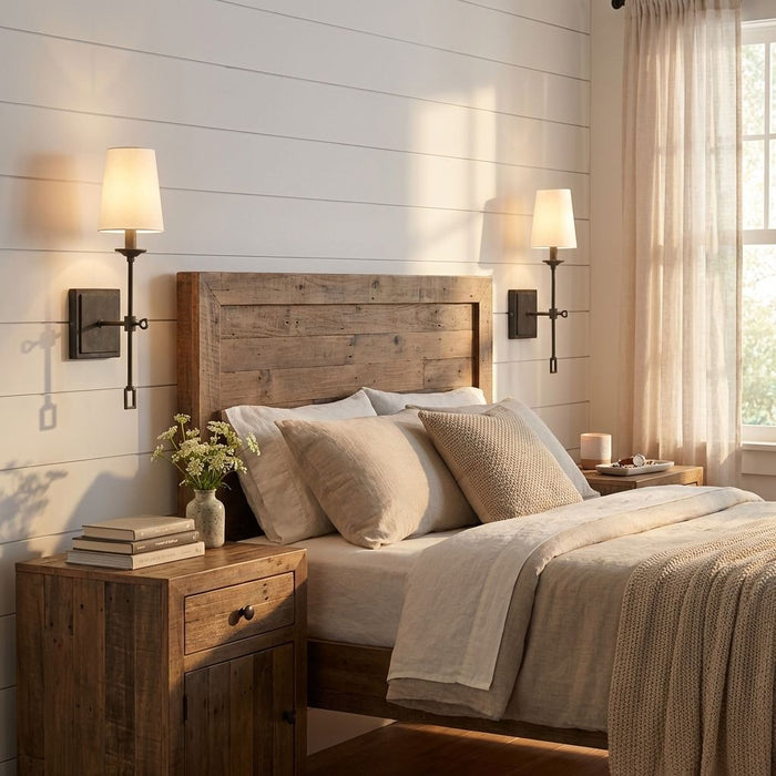 Cozy bedroom with wooden headboard and nightstands, soft lighting, and decorative elements.