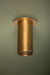 Bronze ceiling light fixture on a green wall