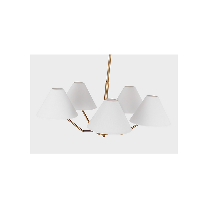 A modern six-light chandelier with a brushed gold metal frame and white tapered drum shades, shown against a light gray background.