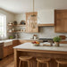 Modern kitchen with wooden cabinets, island, and pendant light.