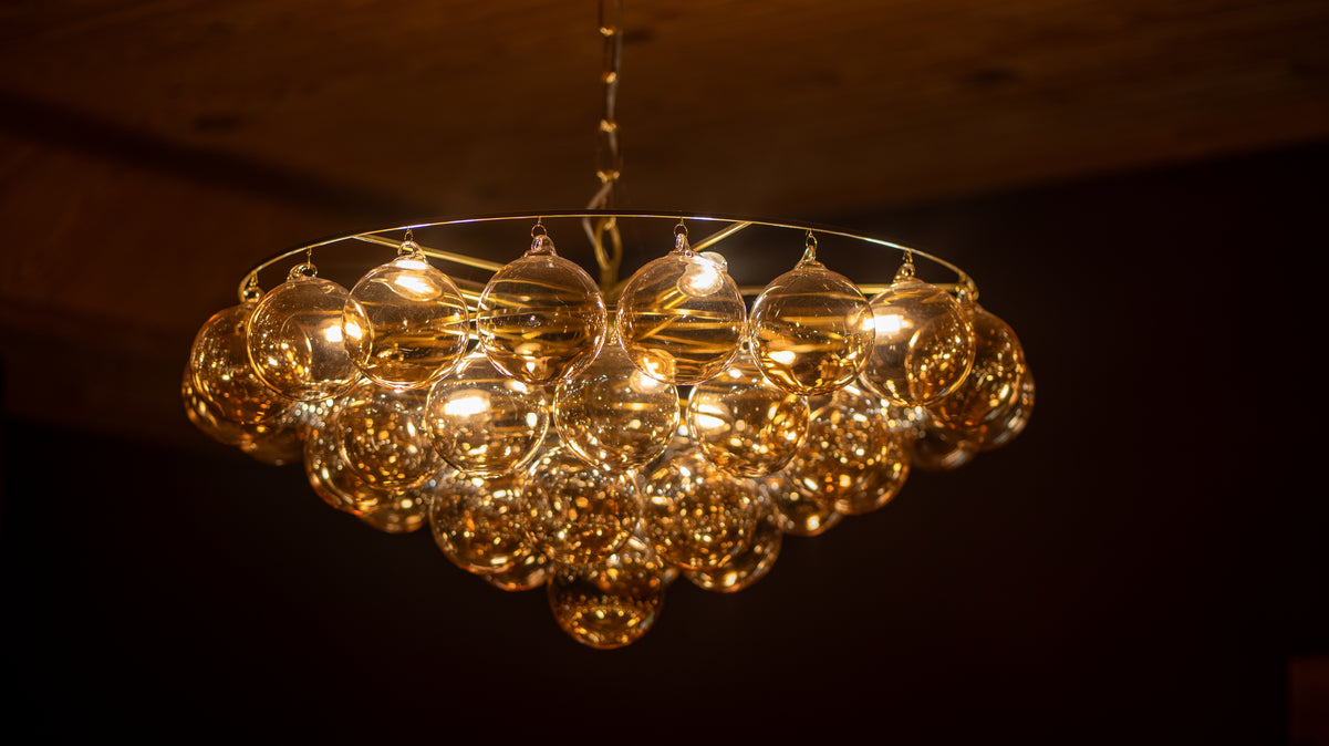 Chandelier with glass balls on a dark background