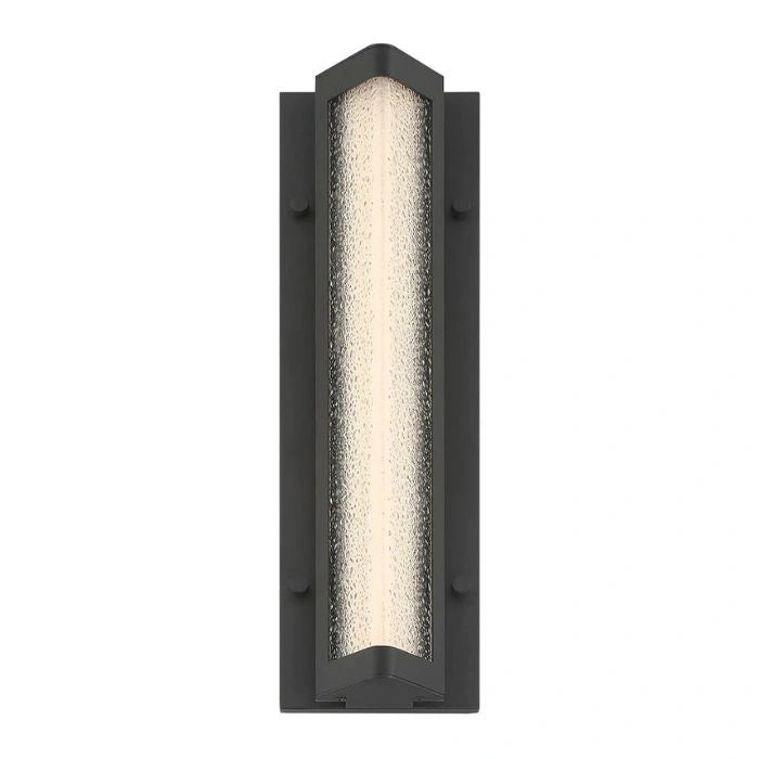 A modern rectangular wall light fixture with a matte black frame and a textured, frosted glass or acrylic front that glows with warm white light, shown against a plain white background.