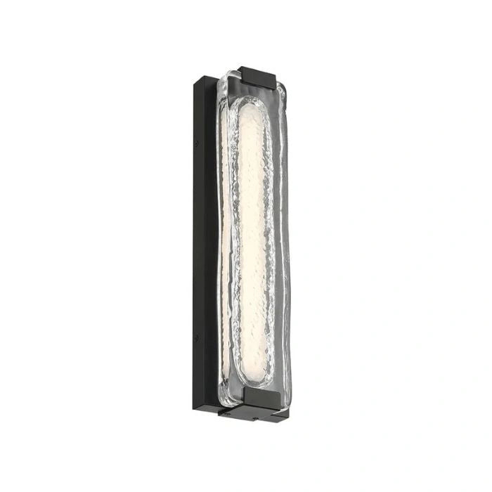 A modern rectangular wall light fixture with a textured clear glass shade and a matte black metal frame, shown against a plain white background.