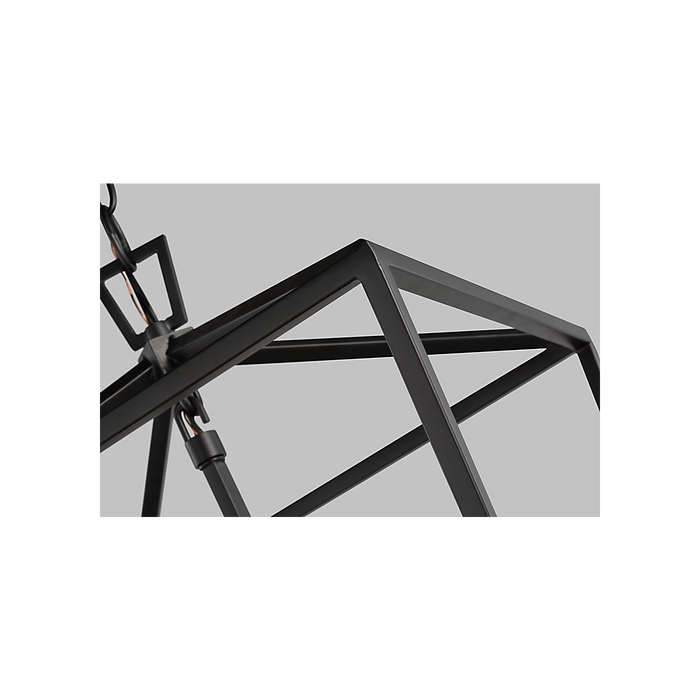 Close-up of black metal lantern frame on a grey background