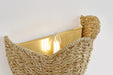 Woven basket sconce with a gold interior  against a white background