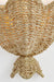 Woven straw wall light fixture on a white background