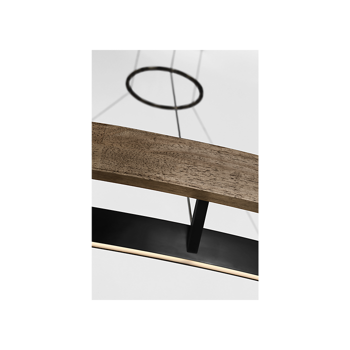 Close up of wooden surface and black metal light strip