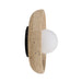 Wall light with a round white globe set in a curved beige stone frame.
