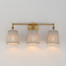 Wall-mounted light fixture with three lampshades on a plain wall.